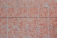 Terracotta en olijfgroen veroveren de badkamer