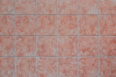 Terracotta en olijfgroen veroveren de badkamer